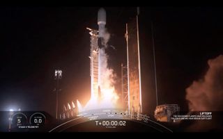 A SpaceX Falcon 9 rocket carrying 57 Starlink internet satellites and two small Earth-imaging craft launches from NASA's Kennedy Space Center on Aug. 7, 2020.