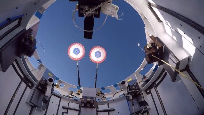 Two drogue parachutes successfully deploy from a Boeing Starliner test article during a landing system reliability test conducted on June 21, 2020, above White Sands Space Harbor in New Mexico. 