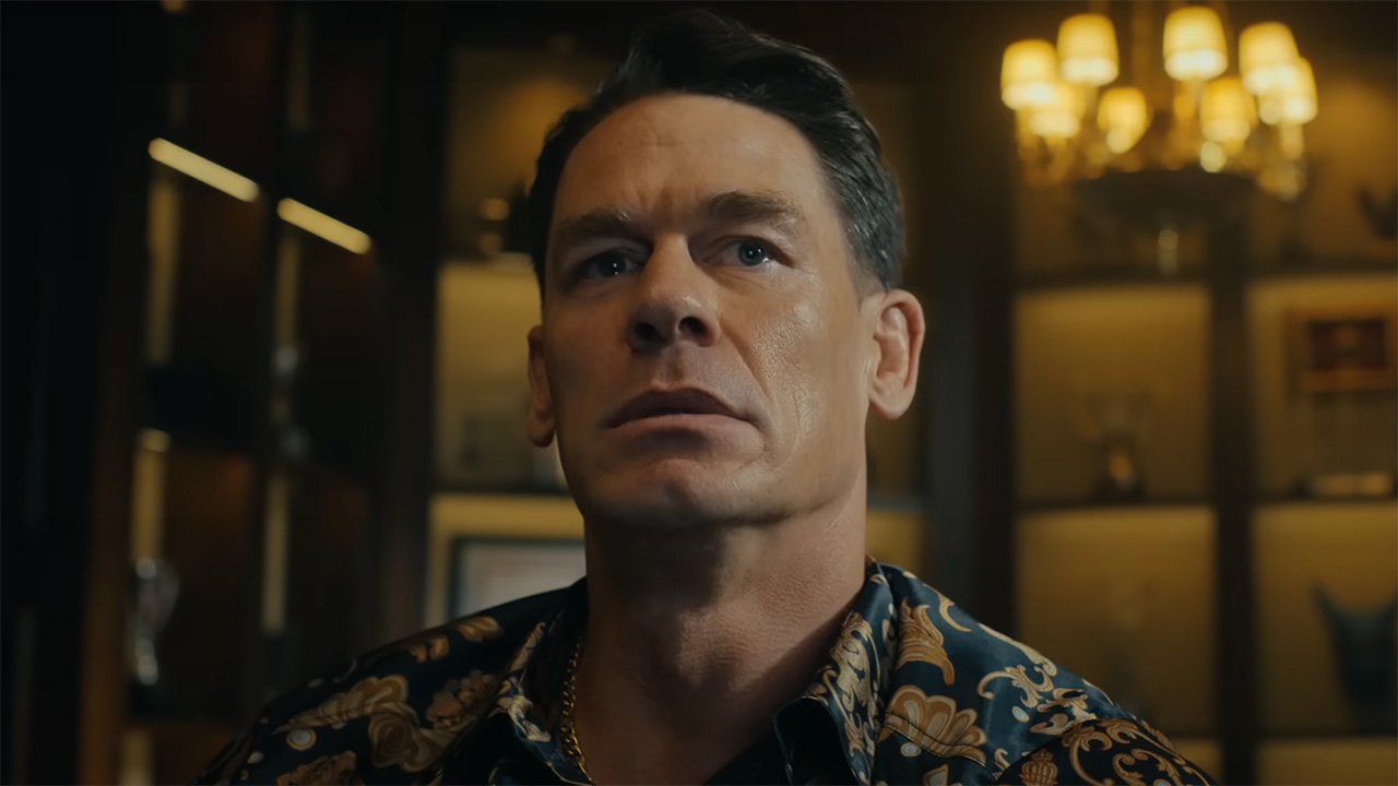 A close up of Chris Smith looking at someone off-screen in Peacemaker season 2 episode 3
