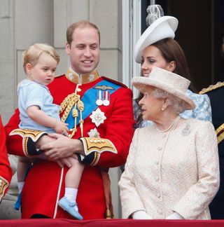 Prince William, Duke of Cambridge, Prince George of Cambridge, Catherine, Duchess of Cambridge and Queen Elizabeth II stand on the balcony of Buckingham Palace during Trooping the Colour on June 13, 2015