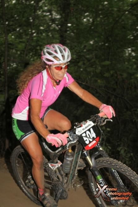 Lori Sable (Team 65?/W&amp;S) in a leans into the tight singletrack