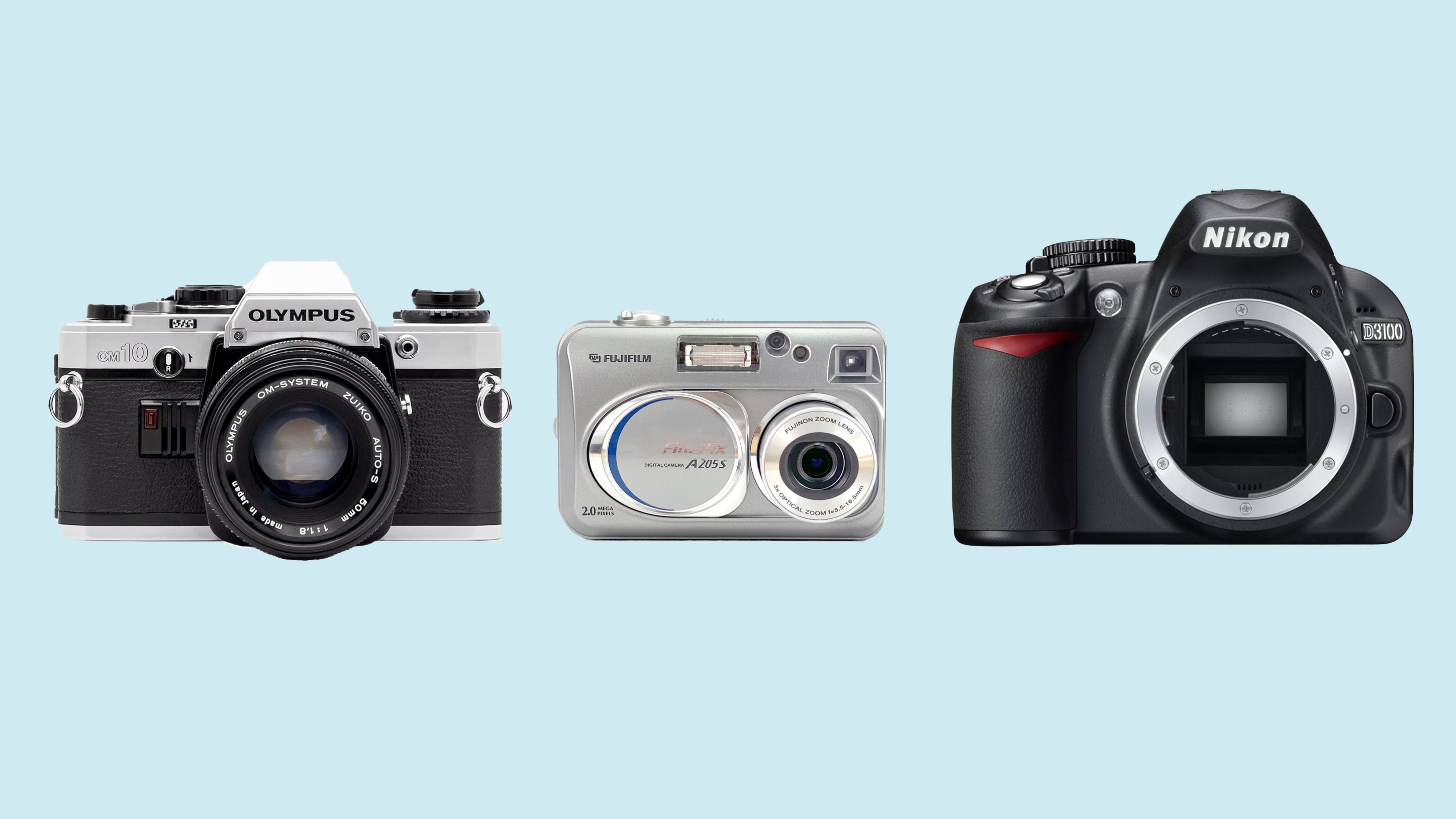 Three different cameras displayed on a light blue background: an Olympus OM-10, a Fujifilm FinePix A205S, and a Nikon D3100