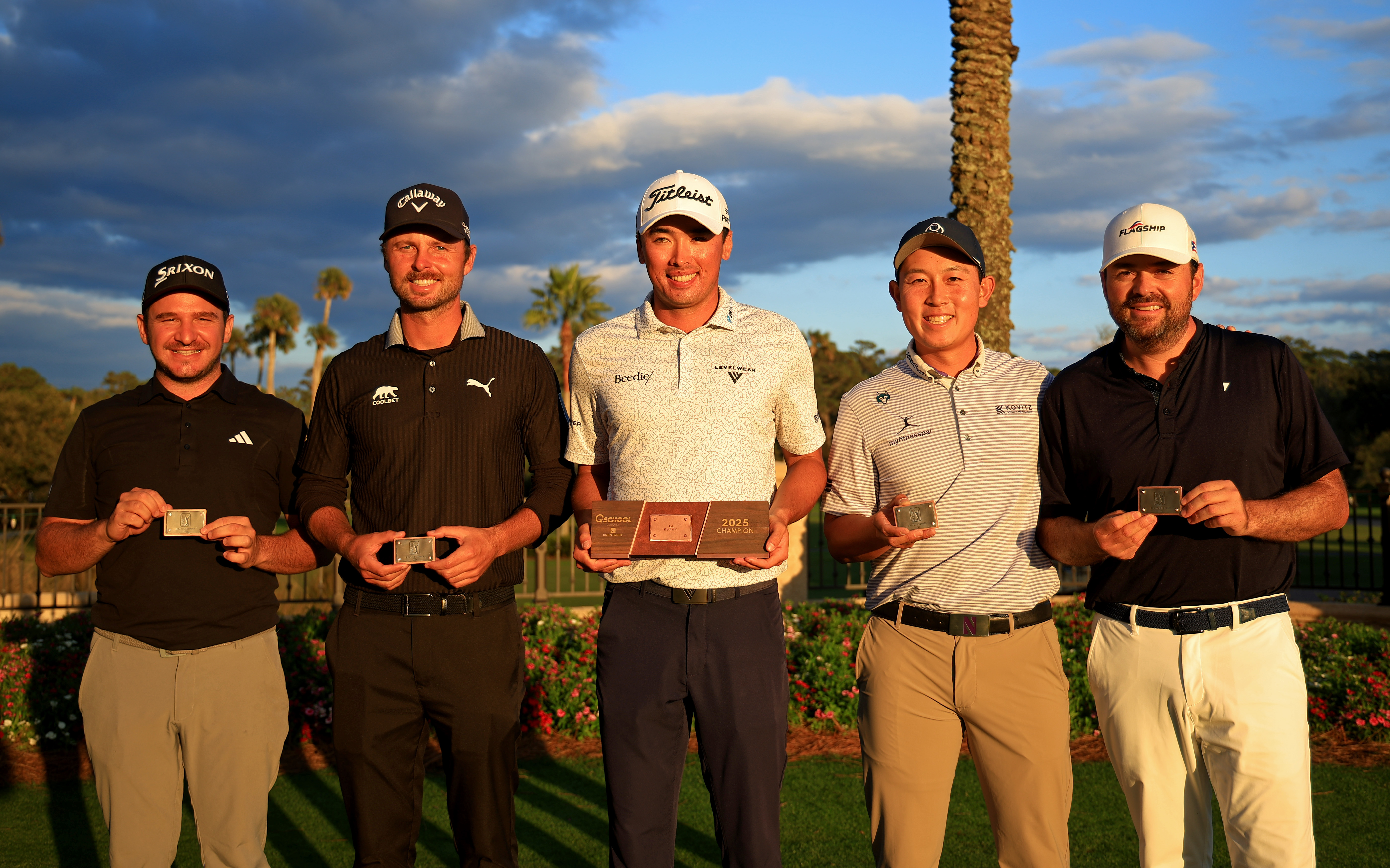Five golfers line-up and show off their PGA Tour cards