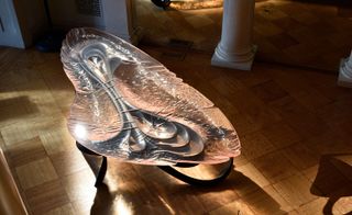 ‘Lumenoria’ table, made from a hand cast-resin surface laid over a sculpted olive ash base.