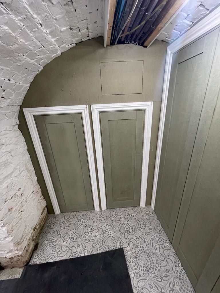 Cupboards being built inside the air raid shelter during a renovation