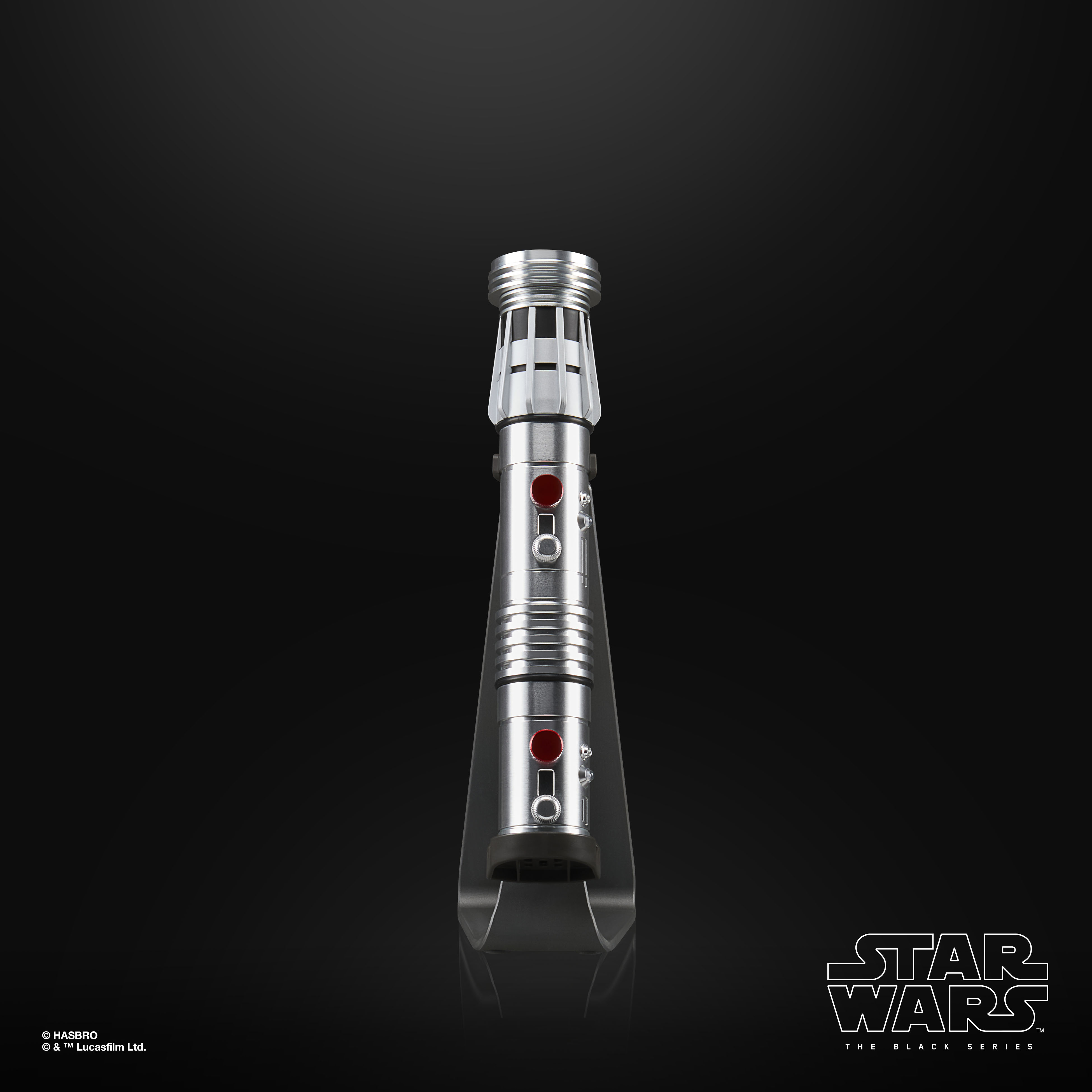 Star Wars The Black Series Force FX Elite Maul Lightsaber hilt and blade on a stand against a black background