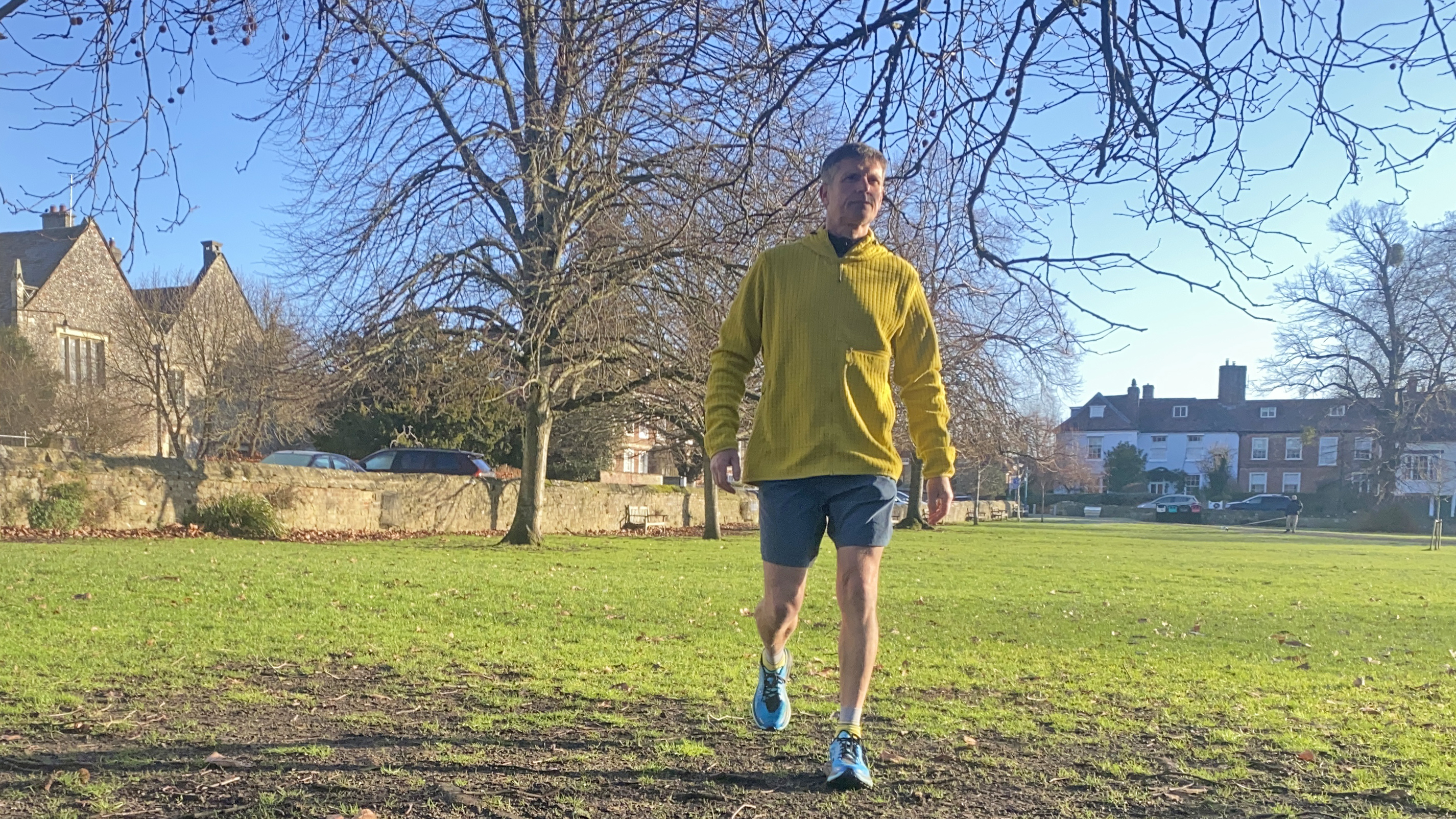 A runner wearing the Rab Ramshaw Hoody