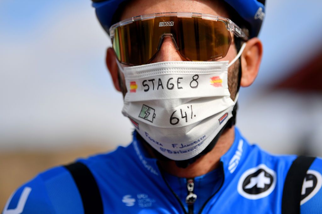 ALTODEMONCALVILLO SPAIN OCTOBER 28 Start Carlos Barbero Cuesta of Spain and NTT Pro Cycling Team Fabio Jakobsen of The Netherlands and Team Deceuninck QuickStep ForzaFabio Decoration Mask Covid safety measures Team Presentation during the 75th Tour of Spain 2020 Stage 8 a 164km stage from Logroo to Alto de Moncalvillo 1490m lavuelta LaVuelta20 on October 28 2020 in Alto de Moncalvillo Spain Photo by Justin SetterfieldGetty Images