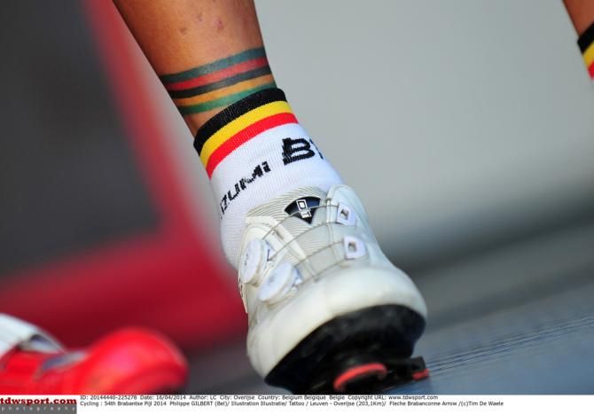 There is no mistaking who this ankle belongs to, Gilbert's rainbow bands are forever etched onto his skin