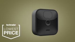 Blink Outdoor home security camera on a khaki background