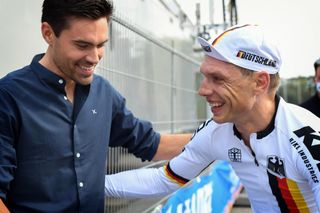 Tony Martin (Germany, on right) talks with Jumbo-Visma teammate Tom Dumoulin (Netherlands) at 2021 UCI Road World Championships after time trial