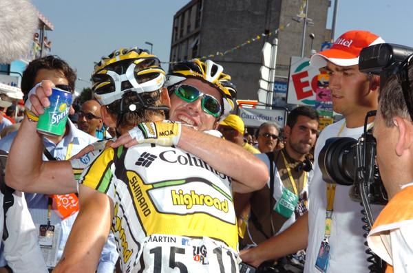 Cavendish hugs teammate Tony Martin after his win