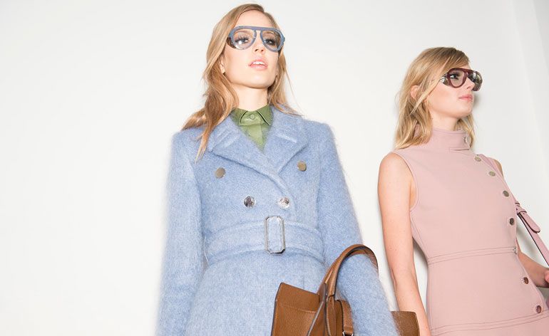 Female models dressed in the Guccii A/W 2014 backstage of the fashion show