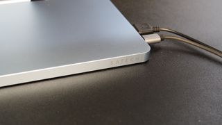 A close up of the Satechi logo on USb-C Slim Dock for iMac
