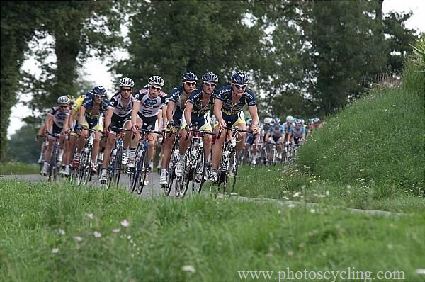 Race leader Bjorn Leukemans' Vacansoleil-DCM squad at the front of the peloton.