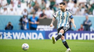 Lionel Messi of Argentina scores his side's first goal from the penalty spot during the FIFA World Cup Qatar 2022 Group C match between Argentina and Saudi Arabia at Lusail Stadium on November 22, 2022 in Lusail City, Qatar.
