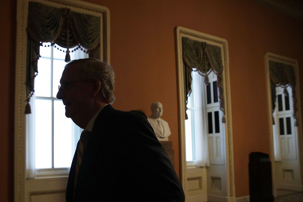 Mitch McConnell returns to his office at the Capitol