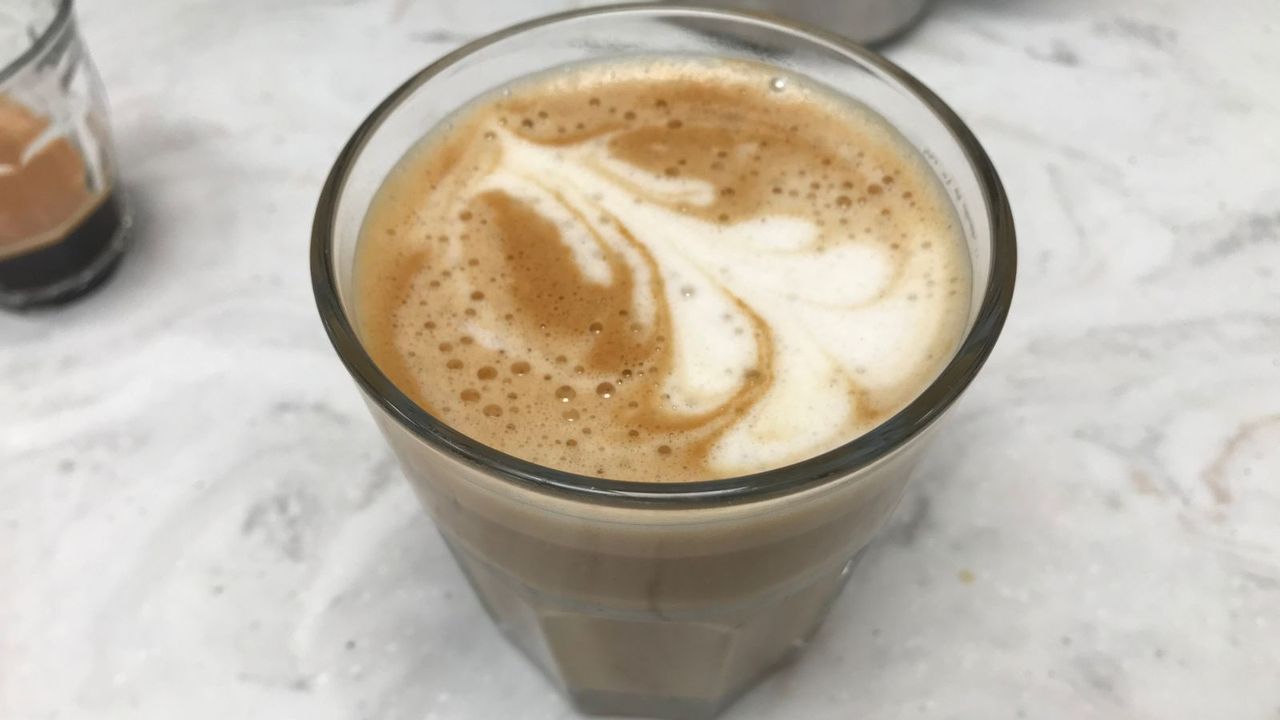 A cup of coffee made with Breville Bambino Plus