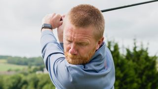 How to swing a golf club - left arm at the top