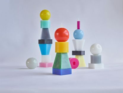 Assorted groupings of first edition Re-Or interchangeable candles by BCXSY
