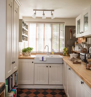traditional utility room with venetian blinds