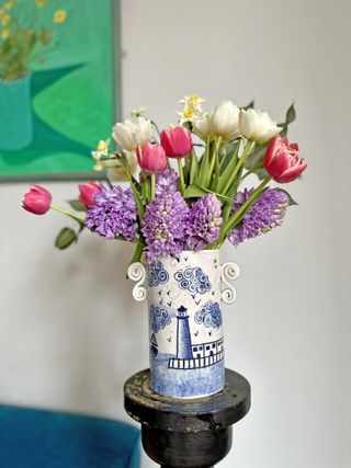 Blue and white lighthouse scene vase