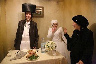 A young couple from Mea Shearim, an Orthodox district in Jerusalem, will spend their first moments alone ever after their wedding ceremony. The 18-year-olds met only once before their arranged marriage.