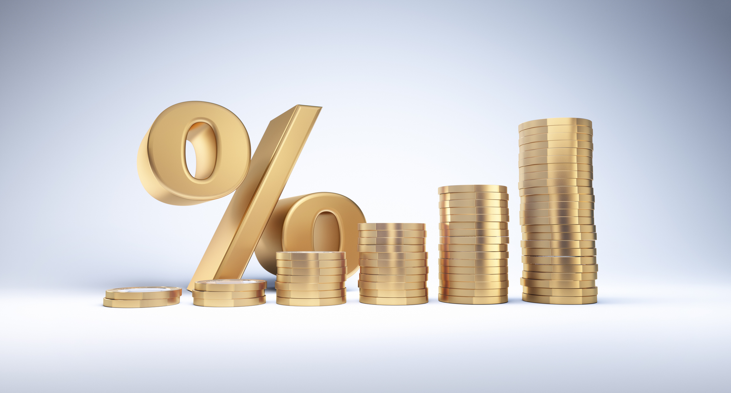 Ascending stacks of golden coins and percentage sign representing dividend yields