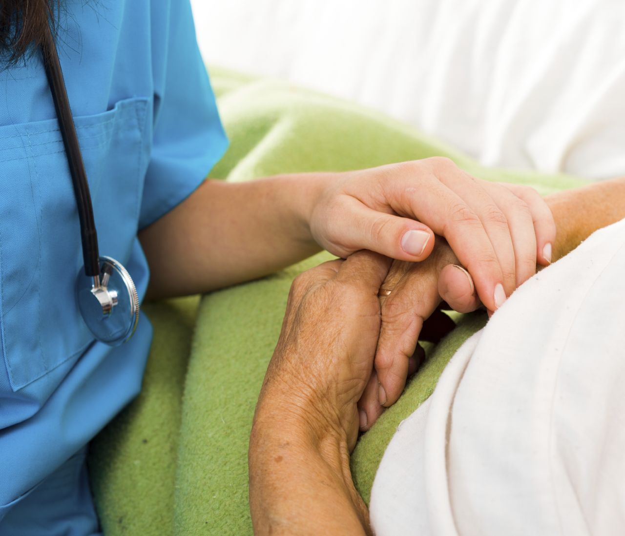 A doctor counsels a patient