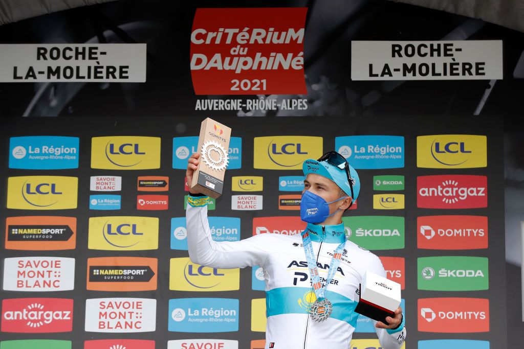 ROCHELAMOLIERE FRANCE JUNE 02 Alexey Lutsenko of Kazahkstan and Team Astana Premier Tech celebrates at podium during the 73rd Critrium du Dauphin 2021 Stage 4 a 164km Individual Time Trial stage from Firminy to RochelaMolire 585m Trophy ITT UCIworldtour Dauphin dauphine on June 02 2021 in RochelaMoliere France Photo by Bas CzerwinskiGetty Images