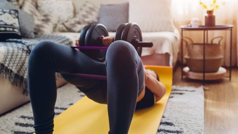 I did 70 weighted glute bridges a day for a week — here’s what happened