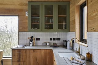 A kitchen with wood detailing