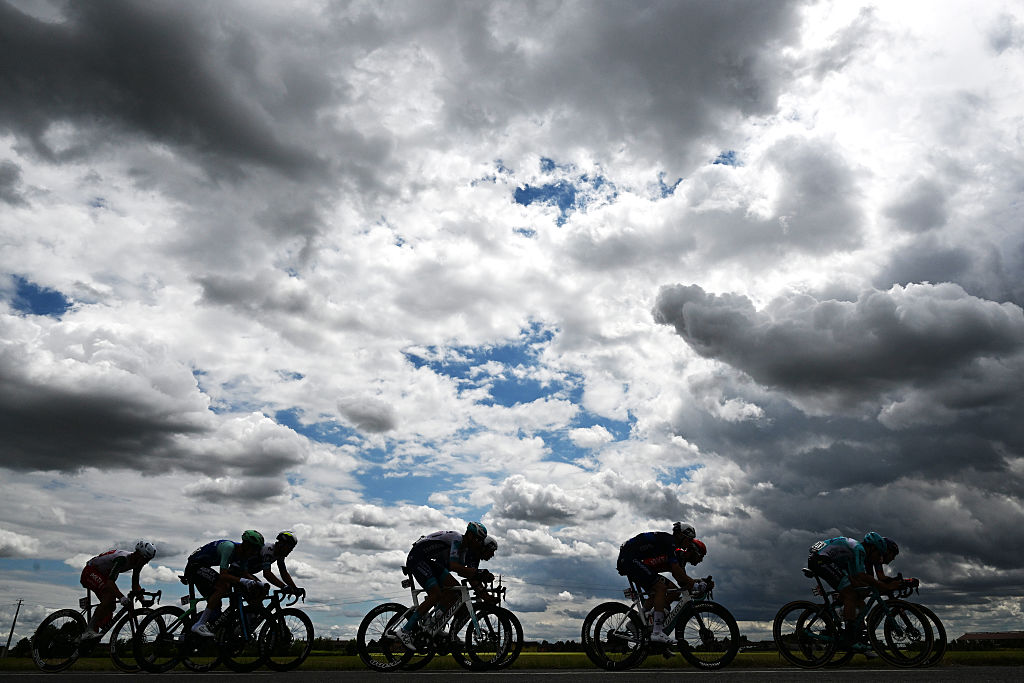 VICENZA ITALY MAY 23 Silhouette of the peloton during the 108th Giro dItalia 2025 Stage 13 a 180km stage from Rovigo to Vicenza UCIWT on May 23 2025 in Vicenza Italy Photo by Tim de WaeleGetty Images