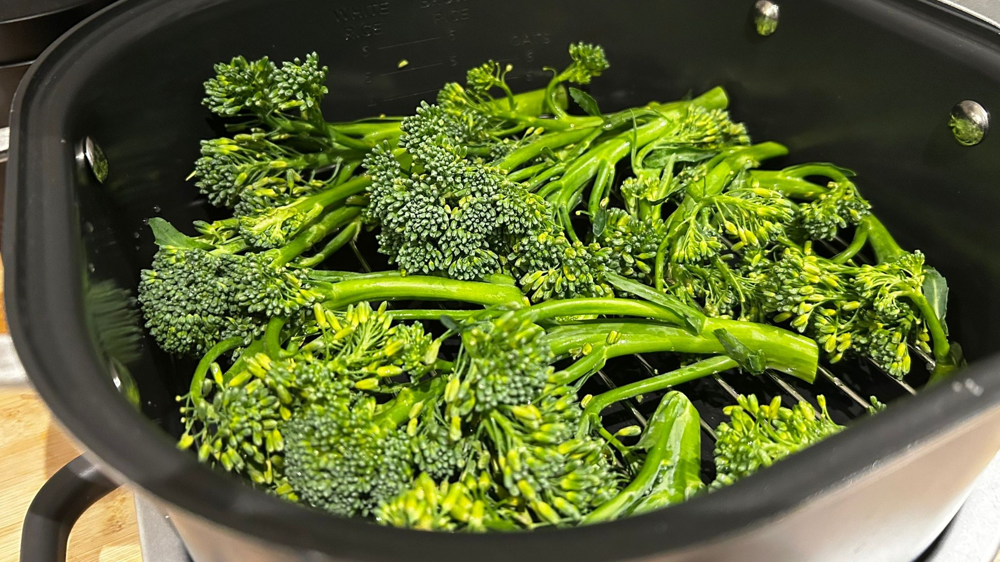 Uncooked broccoli in Ninja Foodi PossibleCooker