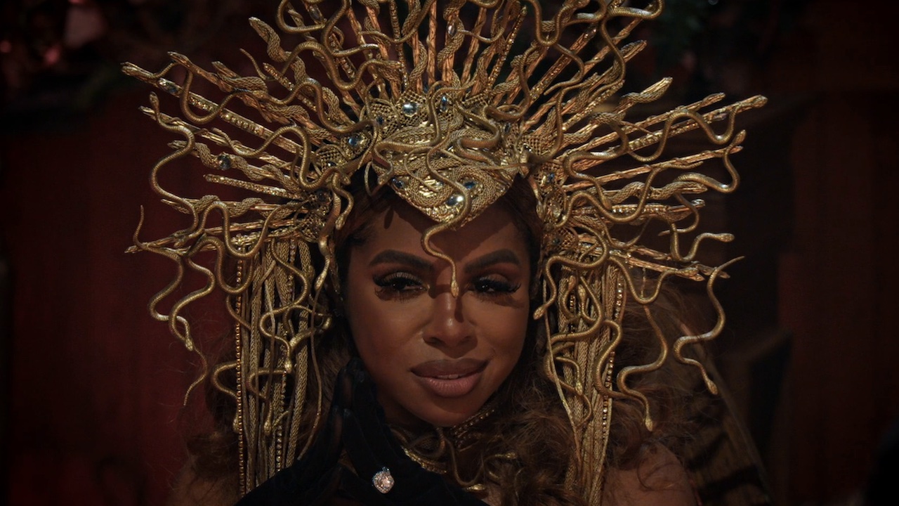 Candiace in her headdress at the Traitors banquet.