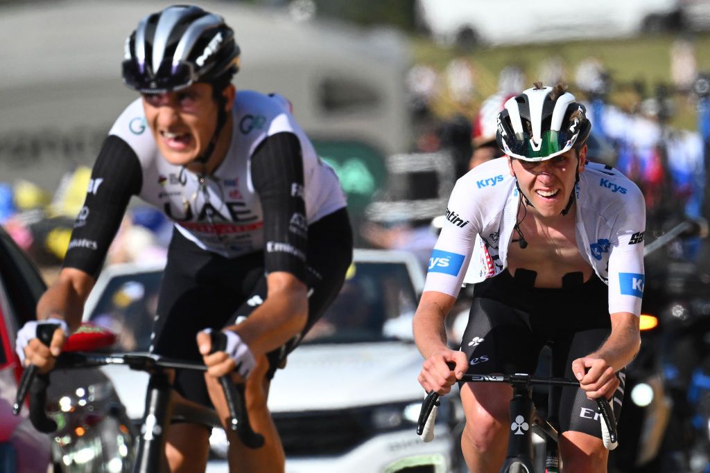 UAE Team Emirates&#039; Slovenian rider Tadej Pogacar wearing the best young rider&#039;s white jersey (R) and UAE Team Emirates&#039; Spanish rider Marc Soler (L) cycle in the ascent of Col de la Loze in the final kilometres of the 17th stage of the 110th edition of the Tour de France cycling race, 166 km between Saint-Gervais Mont-Blanc and Courchevel, in the French Alps, on July 19, 2023. (Photo by Marco BERTORELLO / AFP)