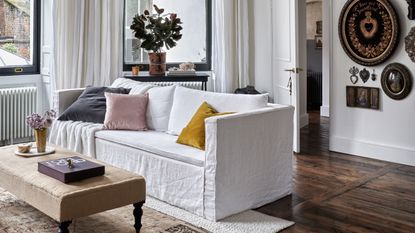 Neutral living room with white sofa