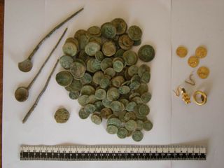 A treasure trove of gold and silver coins along with gold jewelry was uncovered in Israel and dates back to the Roman Empire.