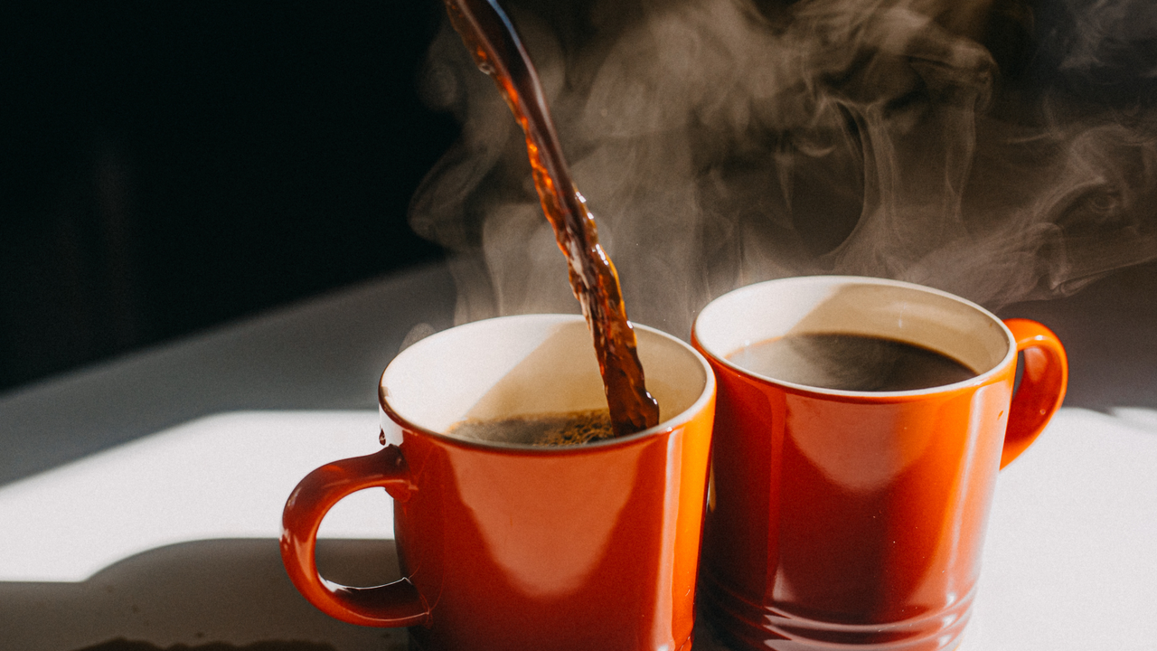 Pouring freshly brewed coffee 