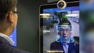 Xu Li, CEO of SenseTime Group Ltd., is identified by the A.I. company's facial recognition system at the company’s showroom in Beijing, China, on June 15, 2018.