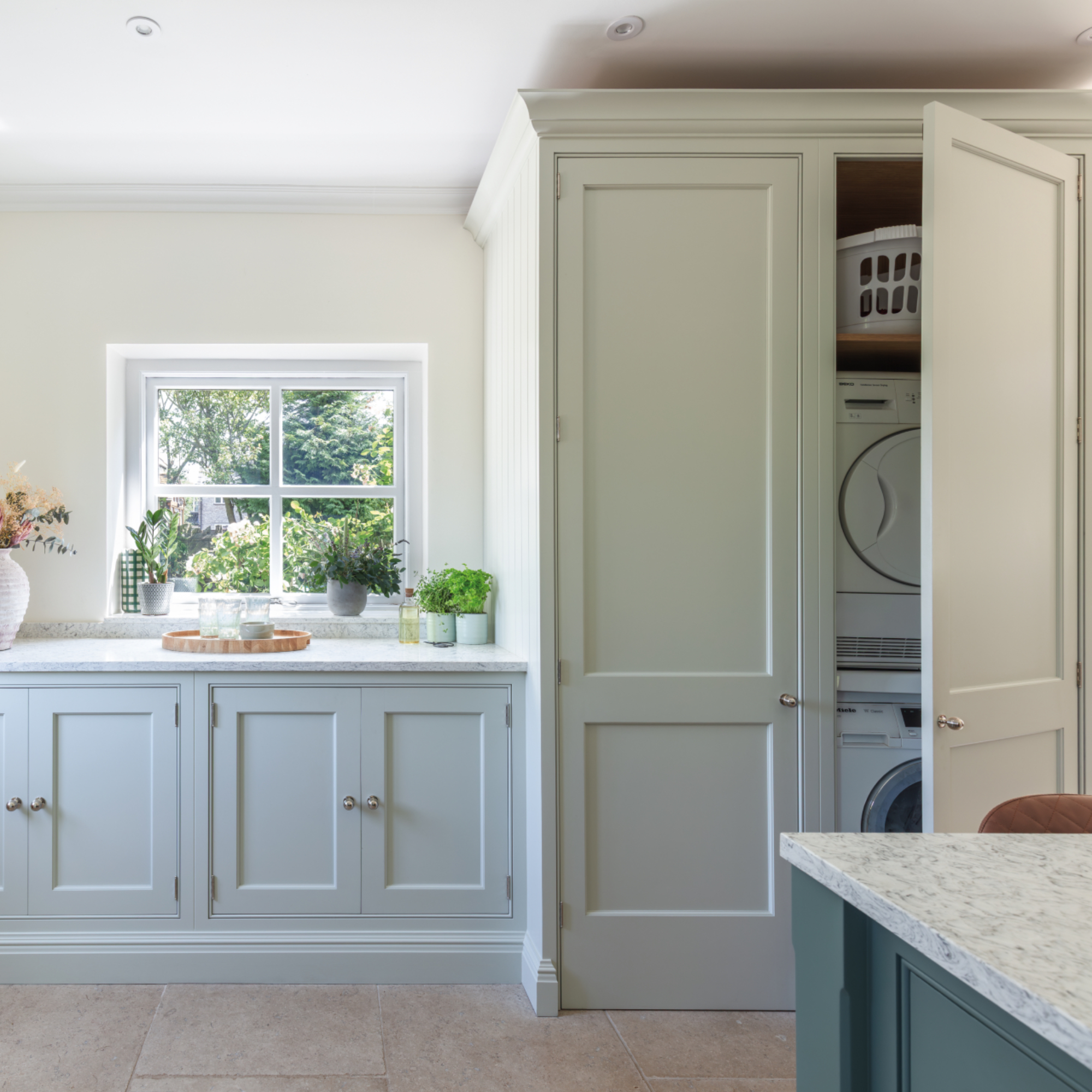 kitchen with integrated laundry area in cabinet