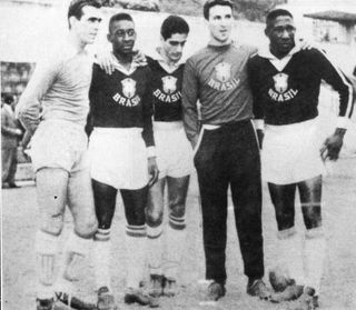 Carlos Castilho (left) poses alongside Brazil team-mates, including Pelé, in 1959.