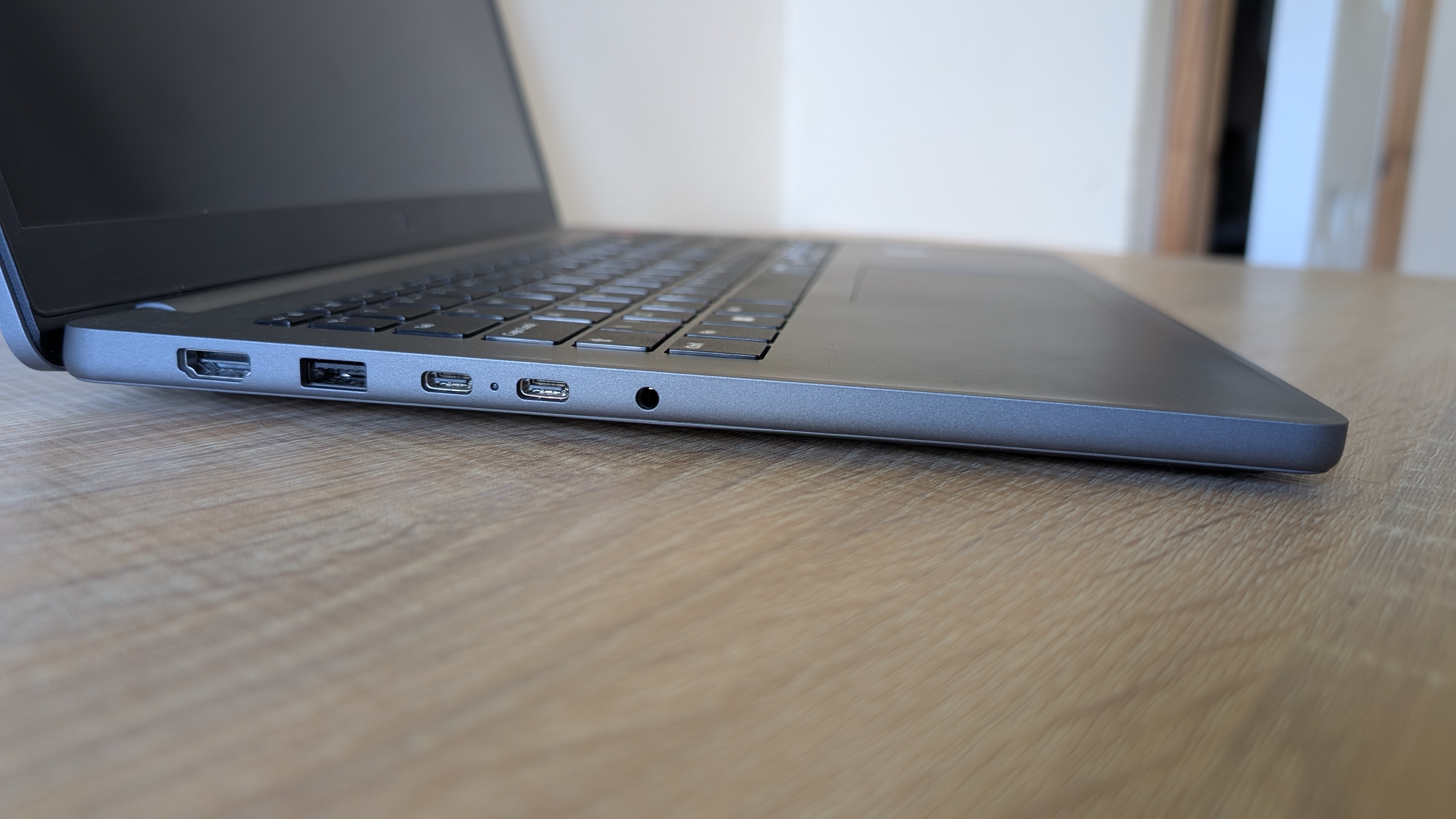 The LG Gram Book laptop pictured on a wooden desk.