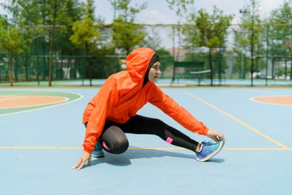 Workout hijabs: A woman stretches after a workout in a workout hijab