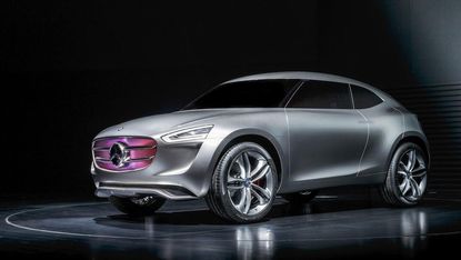 Mercedes' beautiful new Vision G-Code concept car has a solar-panel paint job