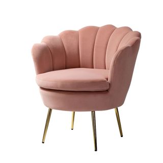 A pink scalloped accent chair