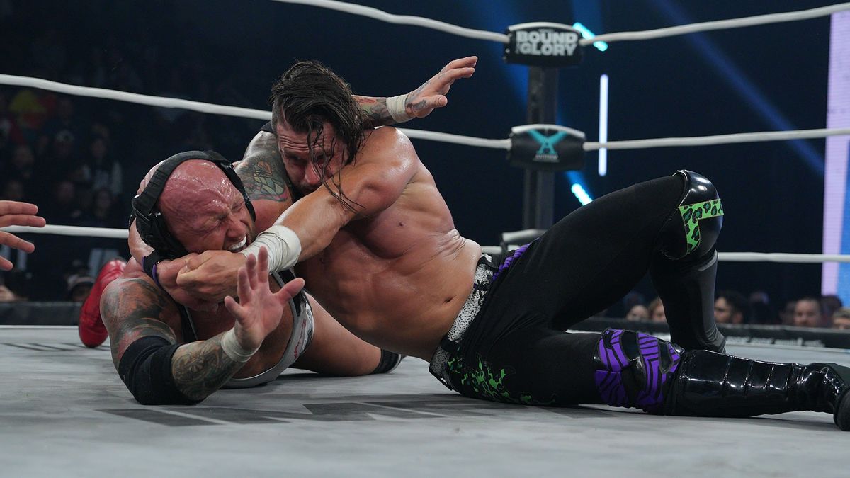 Josh Alexander and Alex Shelley grapple