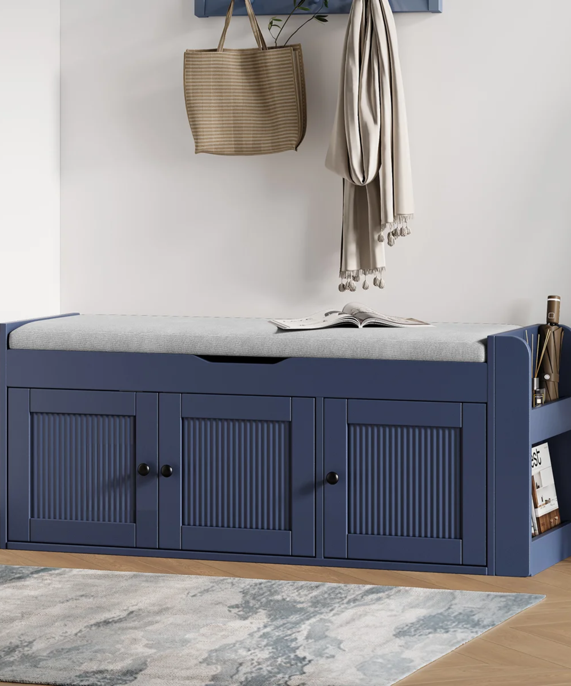 a blue entryway storage bench