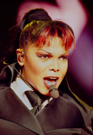 Janet Jackson with a dip-dyed fringe as part of an embarrassing hair trends from the '90s round-up
