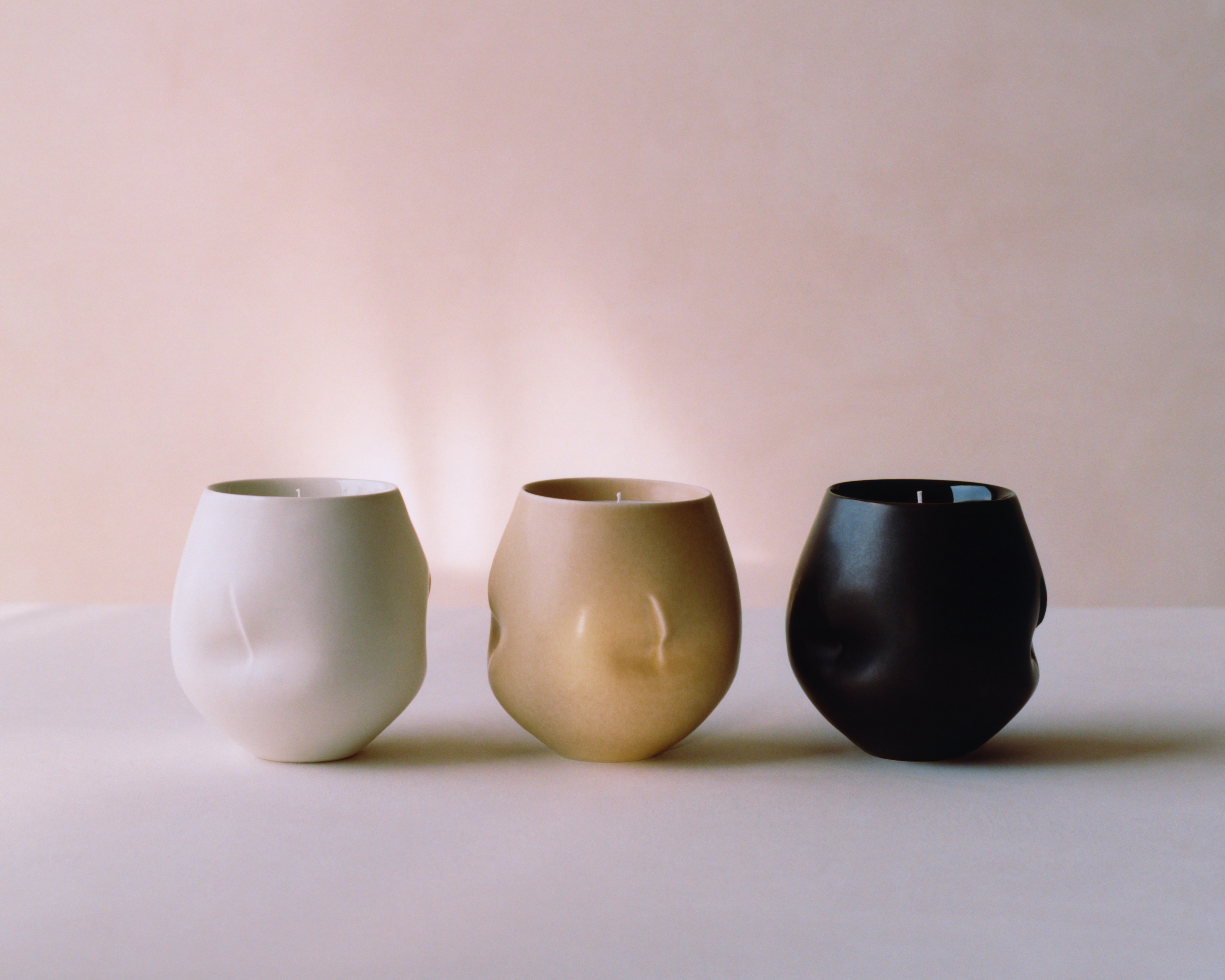 Tekla candles in ceramic vessels